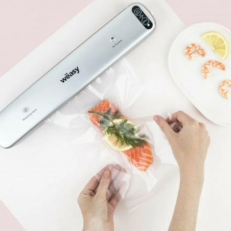Appareil de mise sous vide alimentaire